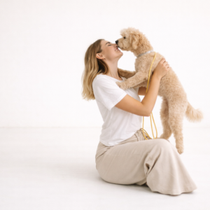 woman and dog sharing a moment